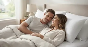 A couple resting comfortably on hypoallergenic pillows for allergies.