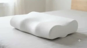 Diagram showing the ergonomic contour of a cervical pillow for neck pain alignment.